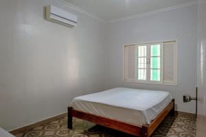 Postel nebo postele na pokoji v ubytování Casa com piscina em São Sebastião próxima a praia e espaços de casamentos + 20 fotografií