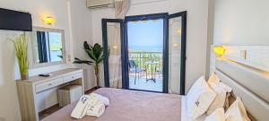 Posteľ alebo postele v izbe v ubytovaní Maria Resort Parga