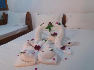 A bed or beds in a room at San Georgio Hotel