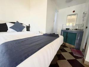 Voodi või voodid majutusasutuse Azure Camotes Resort Hotel toas
