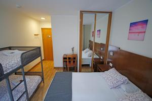Cama o camas de una habitación en Villa de Colunga