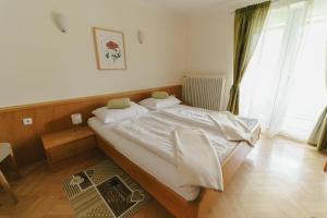 Postel nebo postele na pokoji v ubytování Apartments Stissen - Hideaway am Sonnhügel
