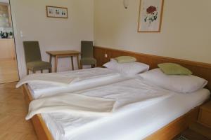 Postel nebo postele na pokoji v ubytování Apartments Stissen - Hideaway am Sonnhügel