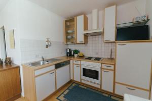 Kuchyň nebo kuchyňský kout v ubytování Apartments Stissen - Hideaway am Sonnhügel + 29 fotografií