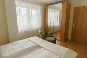 Postel nebo postele na pokoji v ubytování Apartments Stissen - Hideaway am Sonnhügel