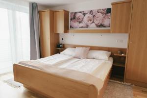 Postel nebo postele na pokoji v ubytování Apartments Stissen - Hideaway am Sonnhügel
