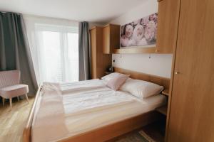 Postel nebo postele na pokoji v ubytování Apartments Stissen - Hideaway am Sonnhügel