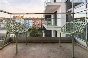 A balcony or terrace at Eco Smart Apartments Premium City