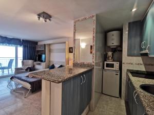 Una cocina o zona de cocina en Villascosette apartamento elypalace 3 6