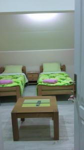 Postel nebo postele na pokoji v ubytování Guest House Konak Iris