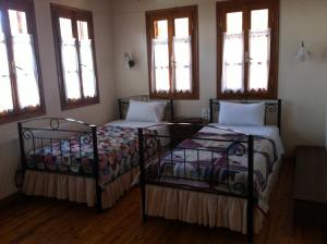 Posteľ alebo postele v izbe v ubytovaní Guesthouse Kolenti