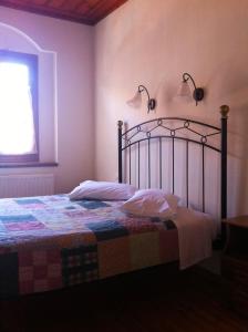 Posteľ alebo postele v izbe v ubytovaní Guesthouse Kolenti
