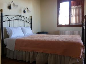 Posteľ alebo postele v izbe v ubytovaní Guesthouse Kolenti