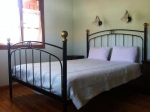 Posteľ alebo postele v izbe v ubytovaní Guesthouse Kolenti