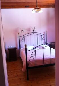 Posteľ alebo postele v izbe v ubytovaní Guesthouse Kolenti