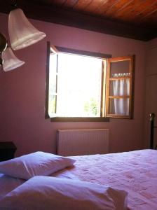 Posteľ alebo postele v izbe v ubytovaní Guesthouse Kolenti