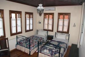Posteľ alebo postele v izbe v ubytovaní Guesthouse Kolenti