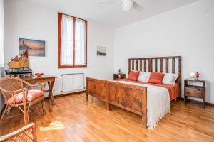 Ένα ή περισσότερα κρεβάτια σε δωμάτιο στο Mostra del Cinema - deliziosa location al Lido