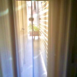 an open window with a view of a room at Residence D'azeglio in Palermo