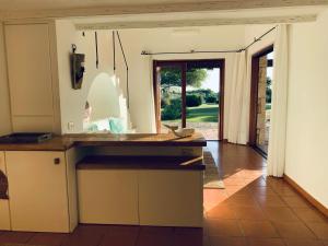 Η κουζίνα ή μικρή κουζίνα στο BouganVilla by the Beach - San Teodoro 1 +12 φωτογραφίες