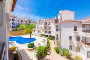 Bazén v ubytování Renteando Albir Apartments nebo v jeho okolí