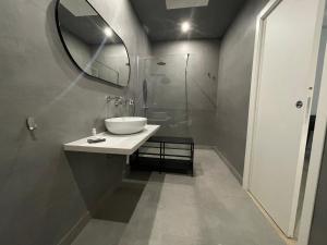Koupelna v ubytování Minioto Rooms
