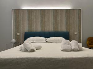 Postel nebo postele na pokoji v ubytování Minioto Rooms + 23 fotografií