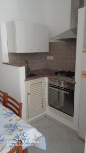 Η κουζίνα ή μικρή κουζίνα στο Ely's Flat
