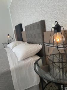 Postel nebo postele na pokoji v ubytování Minioto Rooms