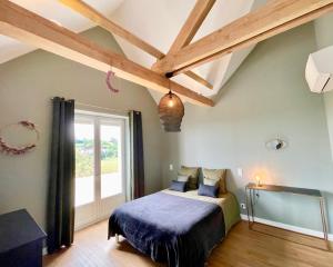 Cama o camas de una habitación en Villa La Roseraie
