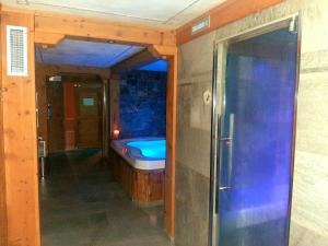 a bathroom with a tub and a sink in a room at Residence Mirage in Oga +135 photos