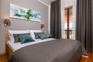 Giường trong phòng chung tại Apartments Valentino