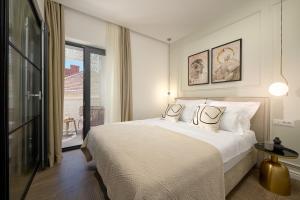 Luxury Apartments Villa Mala Split客房内的一张或多张床位