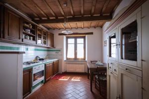 Kuchyňa alebo kuchynka v ubytovaní Santa Fiora Ospitalità Diffusa - Villa Vittoria
