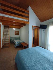 Postel nebo postele na pokoji v ubytování Hostal Restaurant Paca