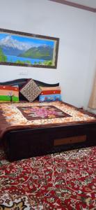 Letto o letti in una camera di Mir manzil