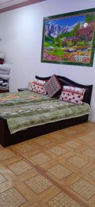 Letto o letti in una camera di Mir manzil