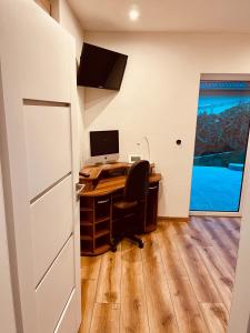 Televízia a/alebo spoločenská miestnosť v ubytovaní Luxus Resort - Zupko