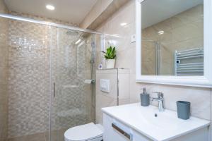 Kúpeľňa v ubytovaní Apartmani Kralj