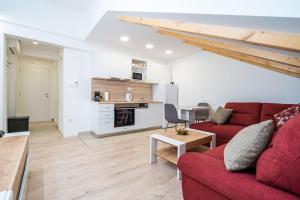 Kuchyňa alebo kuchynka v ubytovaní Apartmani Kralj