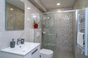 Kúpeľňa v ubytovaní Apartmani Kralj