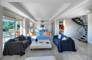 A seating area at Legrena Beach Villa