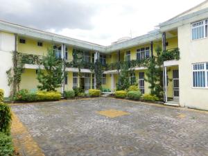 an empty courtyard of a building at Avi Guest House in Addis Ababa