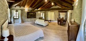 A bed or beds in a room at Agriturismo Il Noce d'Oro