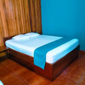 Postel nebo postele na pokoji v ubytování San Bosco Inn