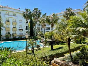 a view of the hotel from the garden at Hacienda de los Nagueles - EaW Homes in Marbella