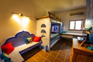 a room with two bunk beds and a desk at Monte Da Coelha AL in Redondo +53 photos