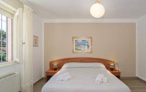 Postel nebo postele na pokoji v ubytování Hotel Ambra