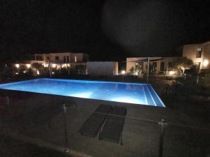 Bazén v ubytovaní Cala Rossa, Pinarello, Saint Cyprien - La Villa D'Alice alebo v jeho blízkosti