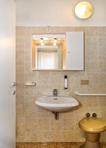 Koupelna v ubytování Hotel Ambra